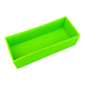 Bright green 2.5 lb silicone loaf liner, durable and long-lasting for perfect baking every time.