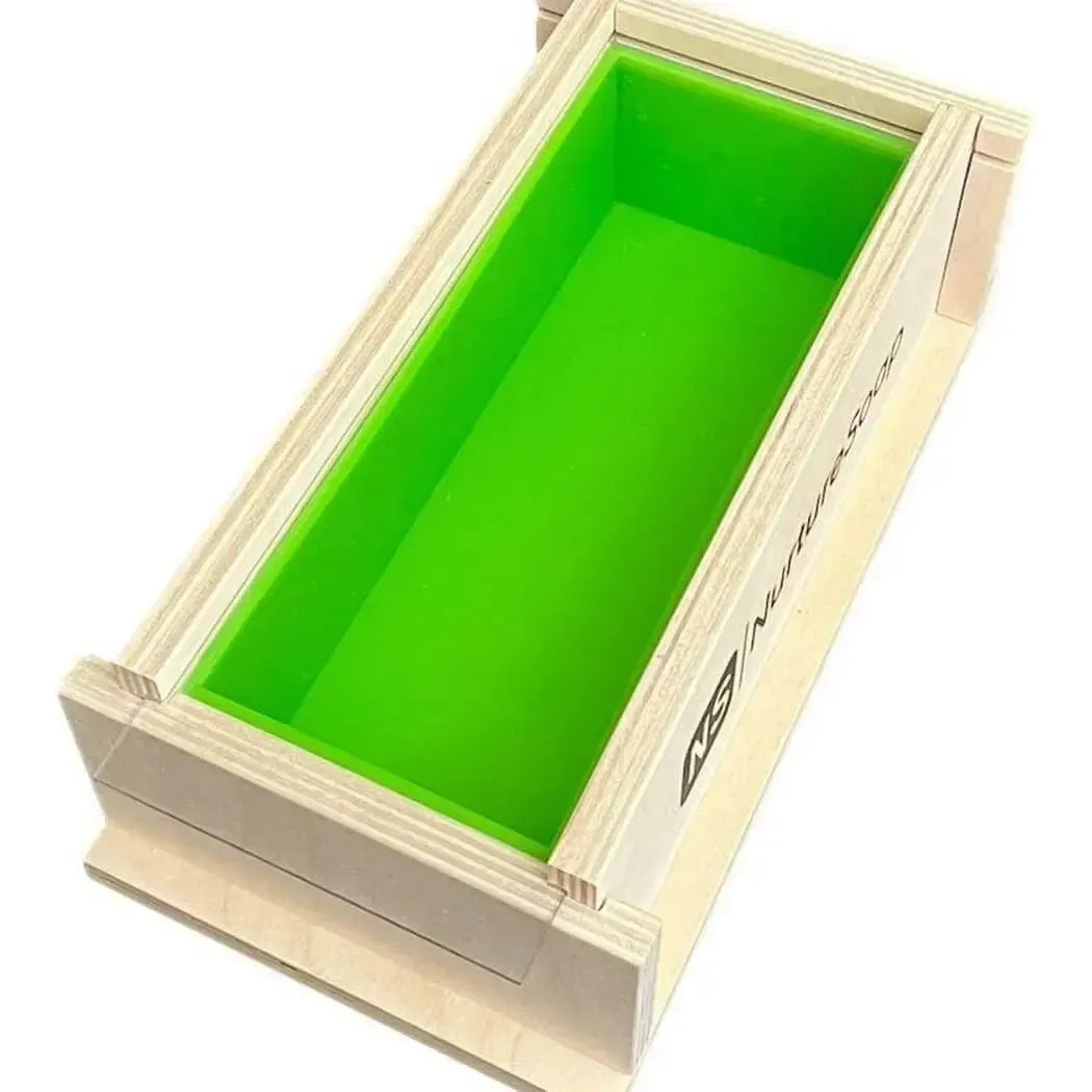 2.5 lb Premium Soap Mold with a bright green silicone liner, perfect for making handmade soaps.