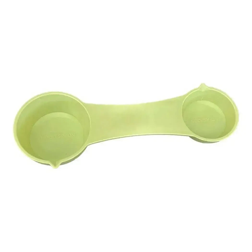 4 Way Measuring Spoon in light green for easy measuring of 1/4 tsp, 1/2 tsp, 1 tsp, and 1 tbsp. Perfect for colorants!