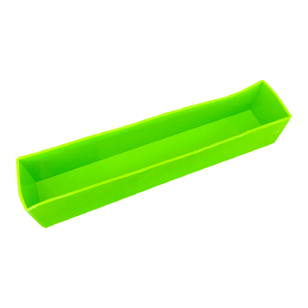 Vibrant green 7.5 lb silicone loaf liner. Perfect for baking, reduced price due to bowing. Final sale only!