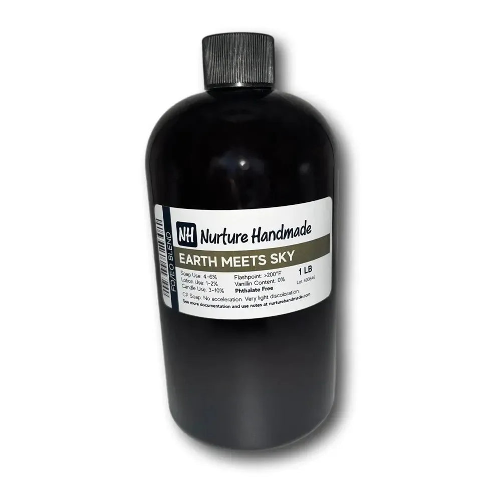 Bottle of Earth Meets Sky fragrance oil featuring grapefruit, patchouli, vanilla, and tonka bean aromas.