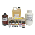 Assorted NurtureSoap supplies, including sodium hydroxide beads and fragrance oils for soap making.