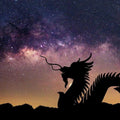 Silhouette of a dragon against a starry night sky, symbolizing magic and mystery.