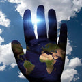 A hand silhouette with a globe overlay, symbolizing the connection between Earth and sky.