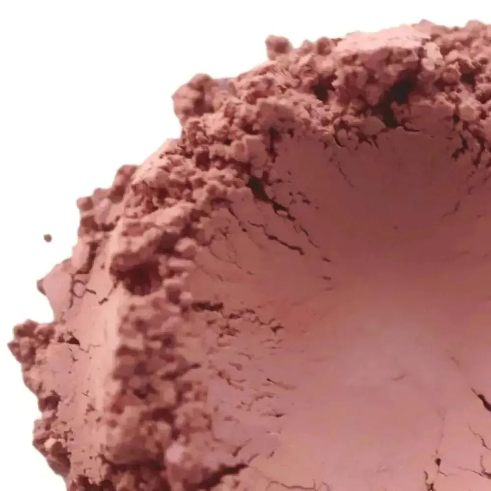 Close-up of Rose Kaolin Clay powder showcasing its soft, pink hue and smooth texture for natural skincare.