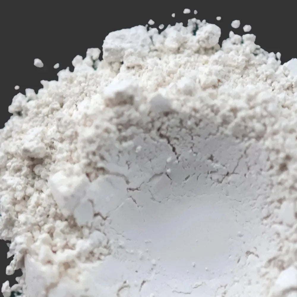 Close-up of fine Kaolin Clay powder, perfect for soap making and enhancing fragrance retention.