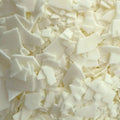 Nurture Soy Container Wax flakes in a close-up view, perfect for easy candle making and vegan-friendly.