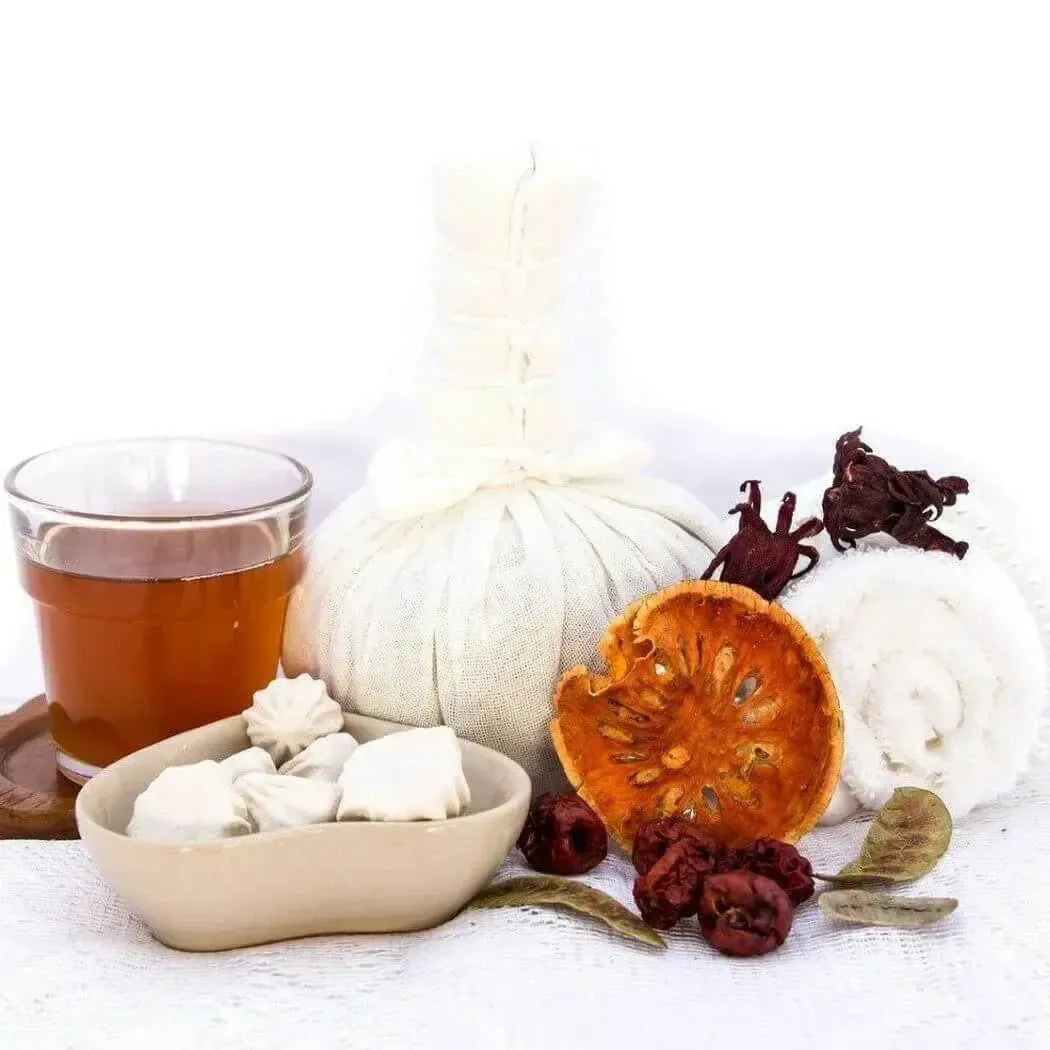 Teacup, dried herbs, and handmade soaps showcasing natural ingredients and wellness vibes.